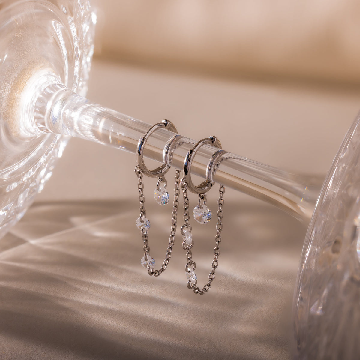 Crystal chain drop huggies
