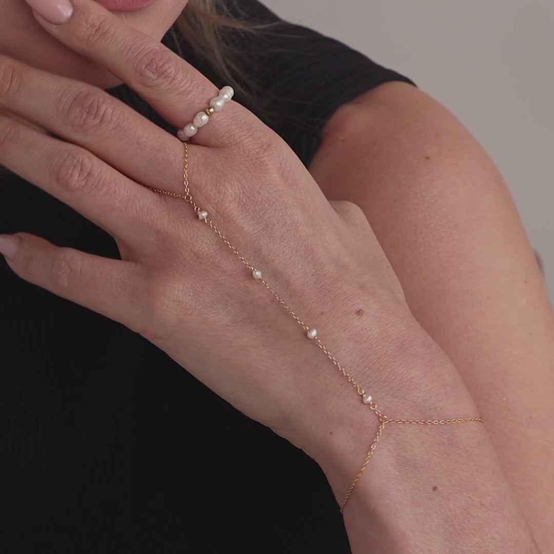 Pearl hand chain bracelet